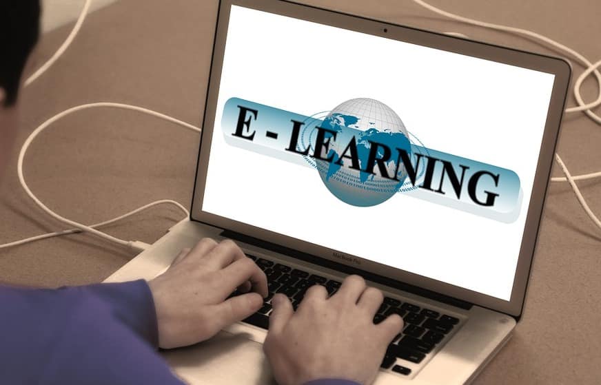 typing on laptop